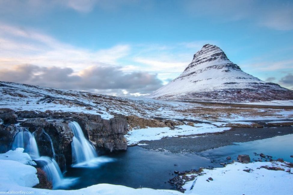 Mount Kirkjufell, Iceland in winter covered in snow.