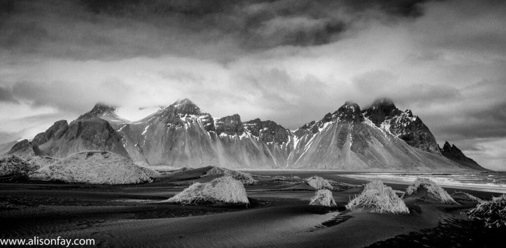 monochroem photograph of the vestrahorn mountain range in Iceland