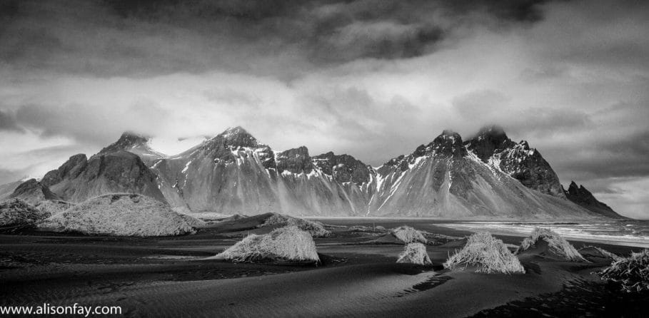 monochroem photograph of the vestrahorn mountain range in Iceland
