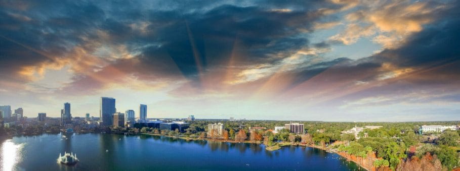 Orlando aerial view, skyline and Lake Eola at dusk.