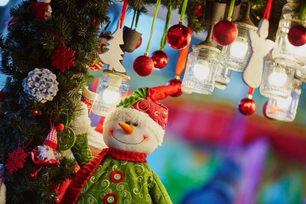 Colorful Christmas decorations and glass lanterns at a Christmas market