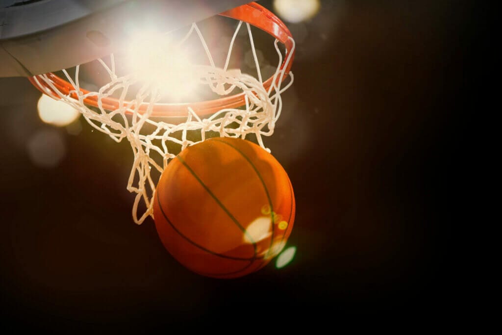 Basketball going through a hoop