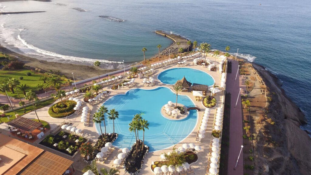 View over the pool area at Iberostar Selection Anthelia towards the ocean and fanabe baech