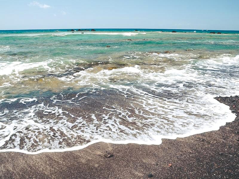 Las Galletas black sand beach