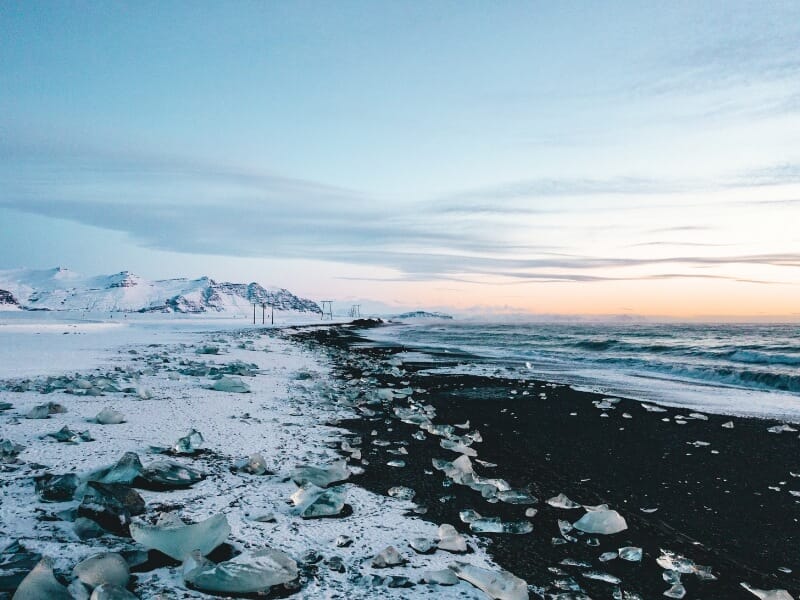 icelands diamond beach covered in snow during the winter