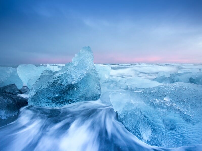 blue chunk of ice on diamond beach