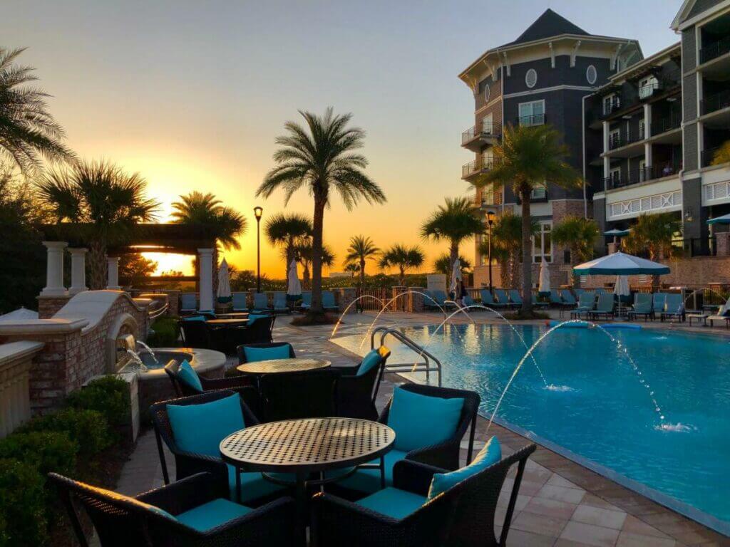 Dining area and outside pool at the henderston beach resort hotel