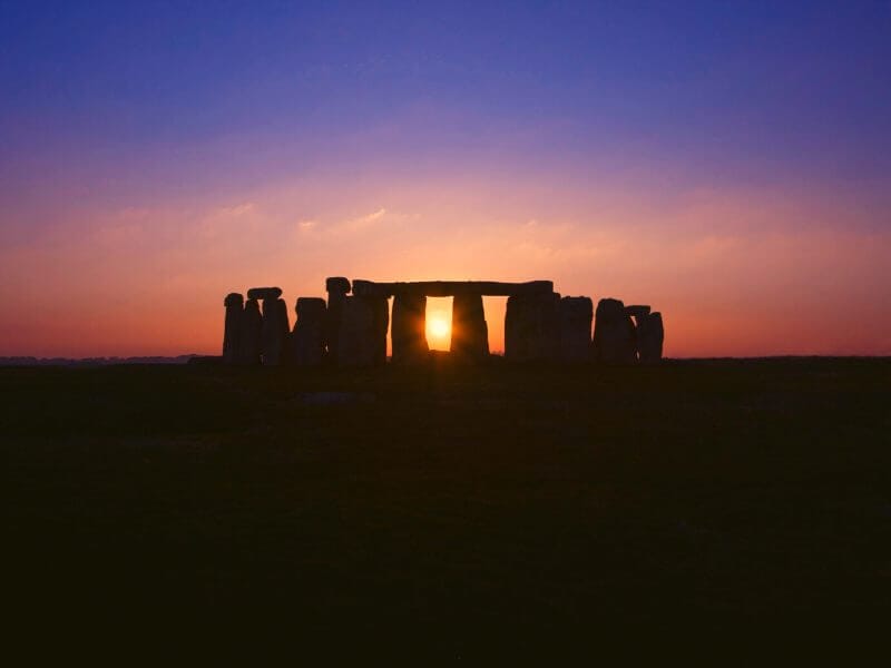 Stonehenge silhouted against the sunset