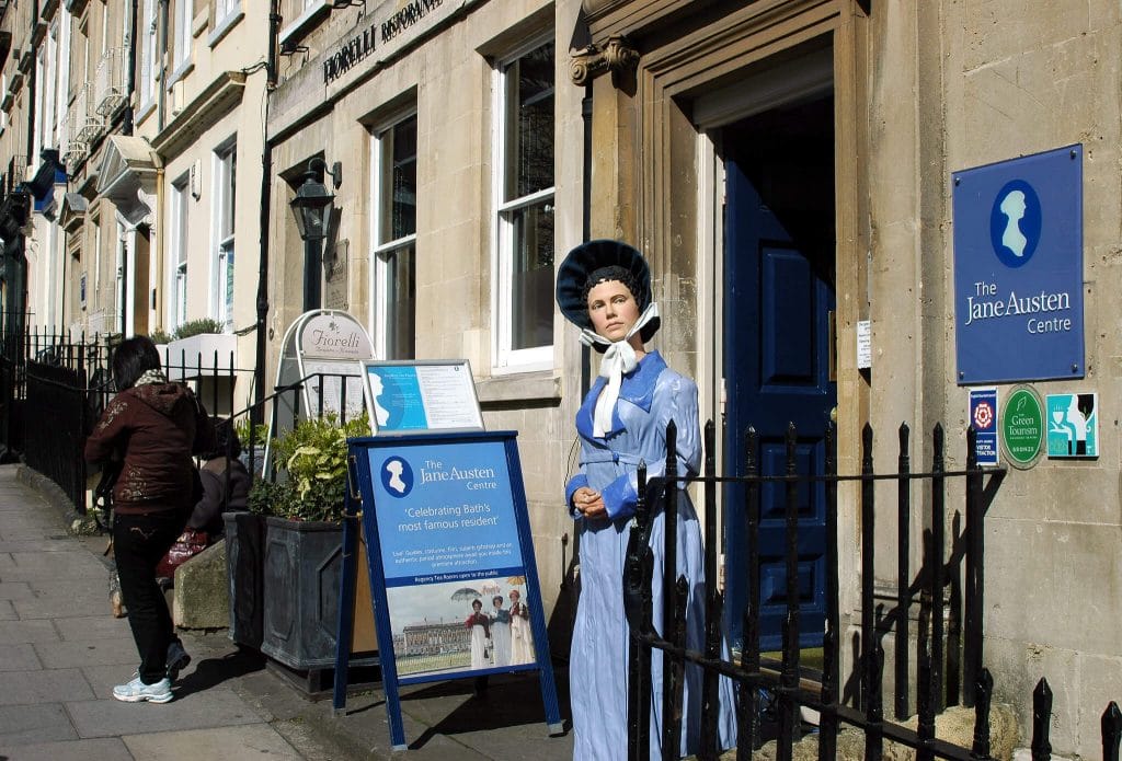 jane austen centre in Bath with a wax figure outside wearing a blue dress.