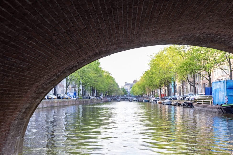 Cruising under a bridge in Amsterdam, Netherlands