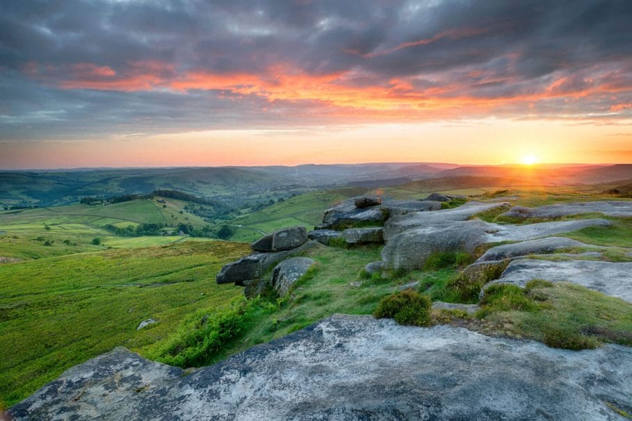 Dramatic sunset sky over Higger Tor in the Peak District national park