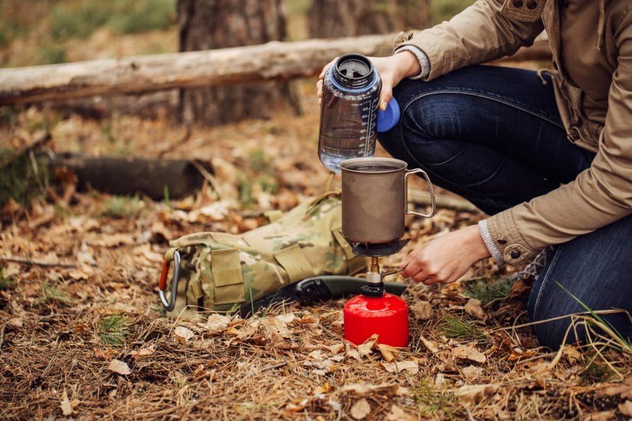Using a camp stove to heat water