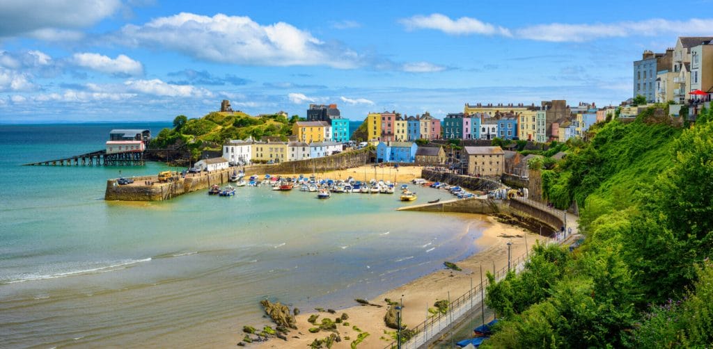 Panoramic view of colorful houses and harbor in historical Tenby Old town, the popular resort in South Wales, Pembrokeshire, United Kingdom