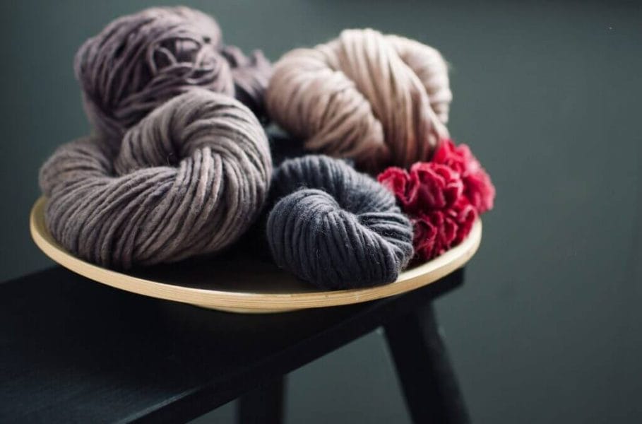 grey, red, beige and dark grey merino wool